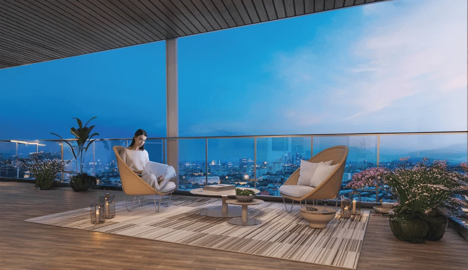 Wide private deck overlooking the Bengaluru skyline at blue hour