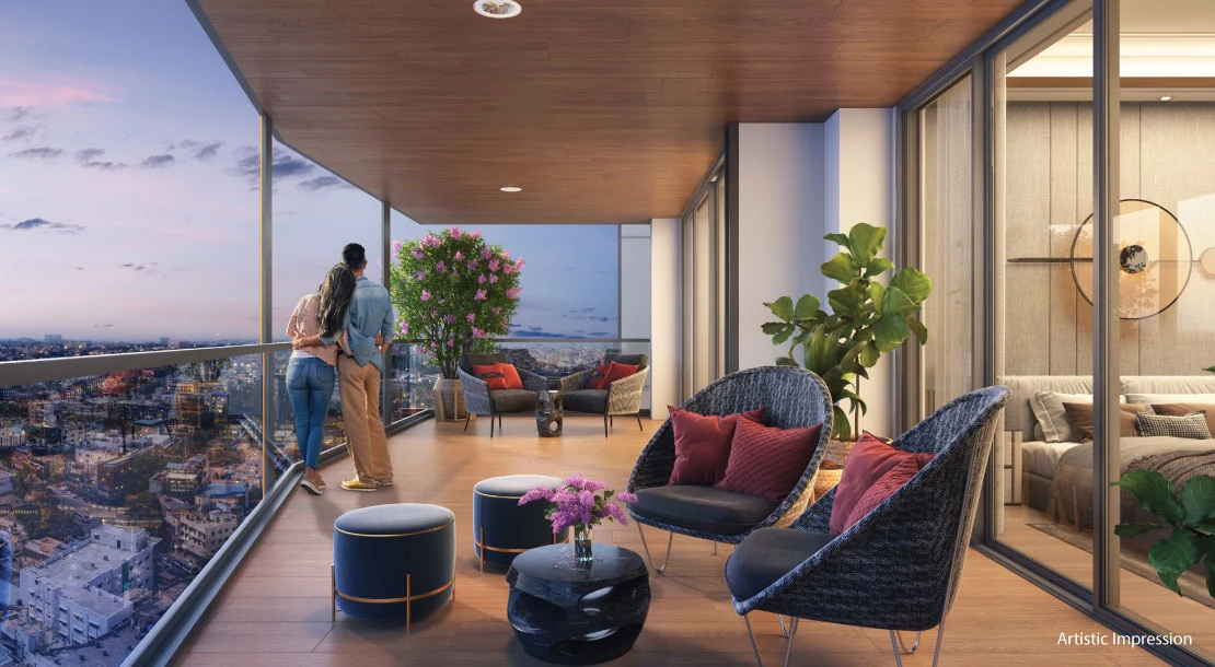 Private deck lounge of a Purva Orient Grand residence at dusk