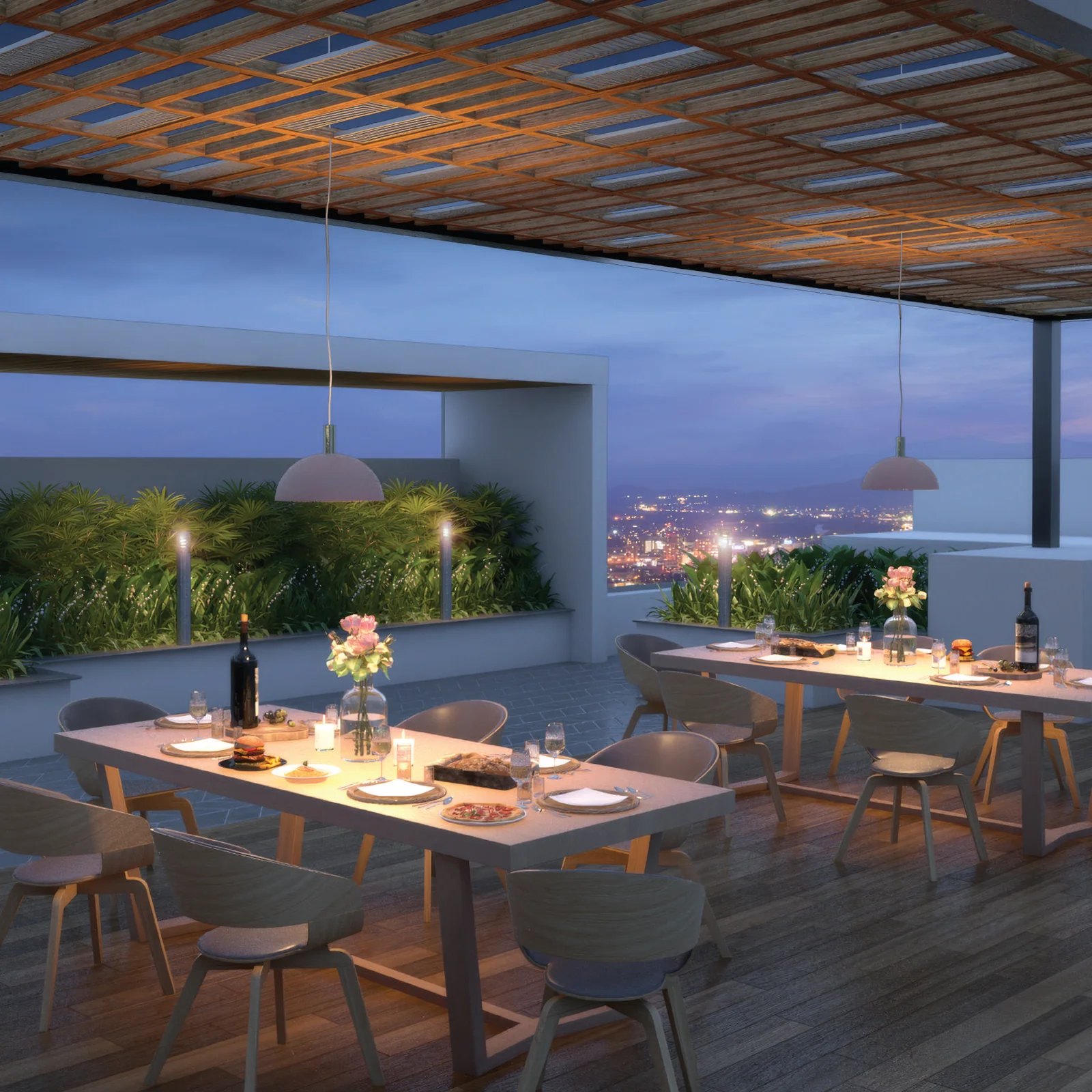 The Dovecote rooftop dining terrace under a pergola, with city lights at night