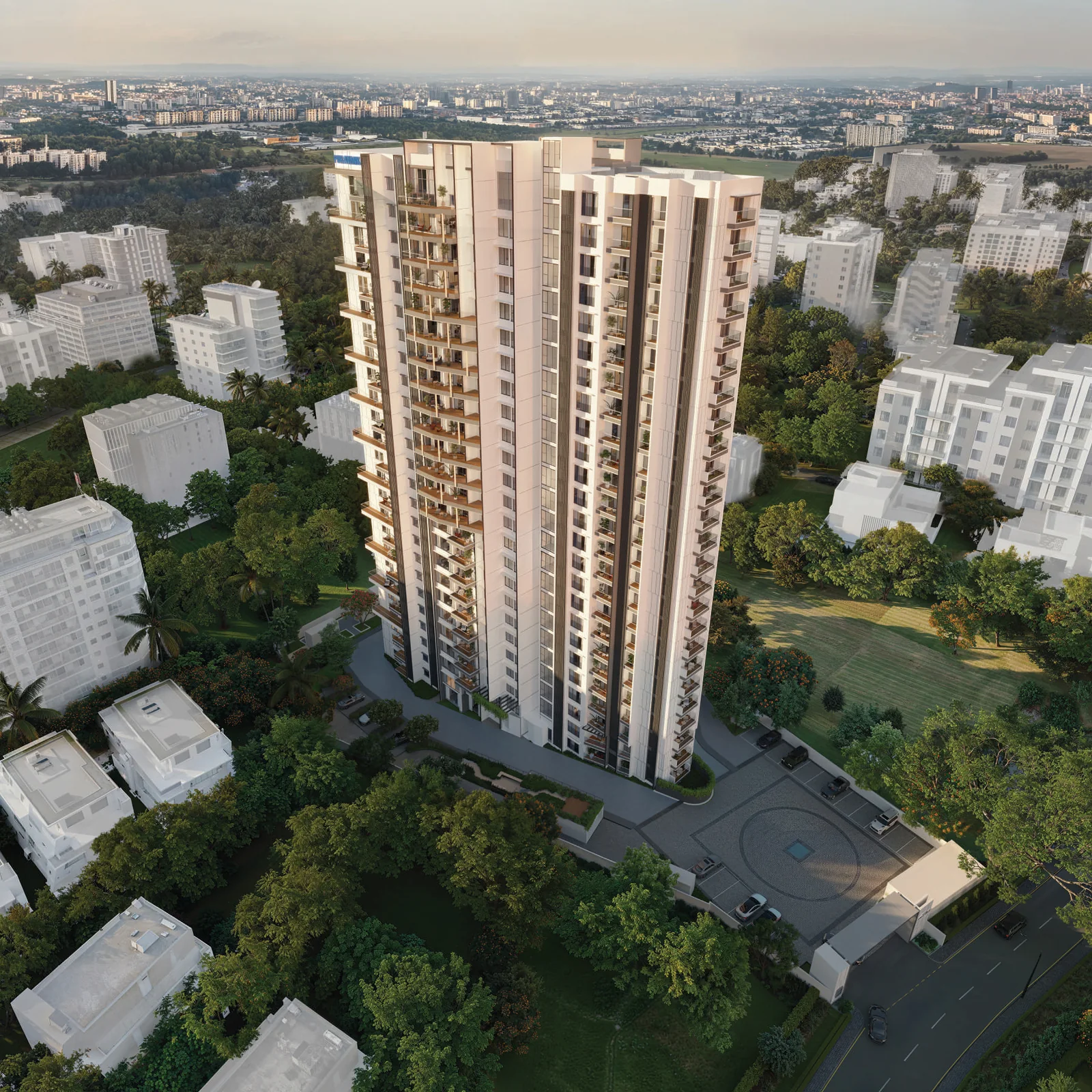 Aerial render of the single Purva Orient Grand tower, its arrival court and the green Sudhama Nagar neighbourhood around it