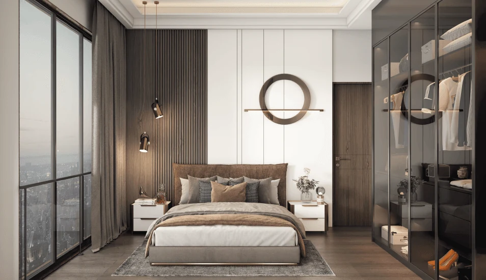 Bedroom at Purva Orient Grand with laminated wood flooring, a panelled feature wall and a full-height glazed wardrobe